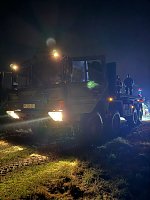 Bild: Unimog-Bergung auf schlammigem Weg