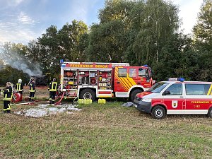 M&auml;hdrescher in Flammen 